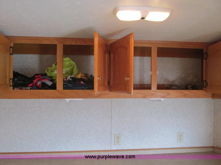 image for item F4402 2002 H&H 28' cargo trailer with living quarters