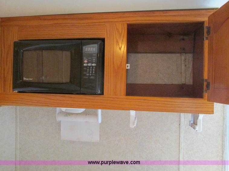 image for item F4402 2002 H&H 28' cargo trailer with living quarters