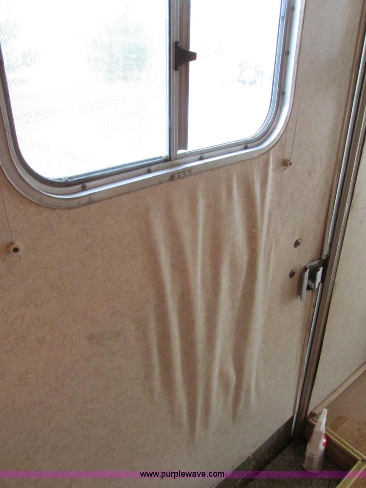 image for item F4402 2002 H&H 28' cargo trailer with living quarters