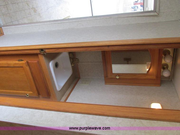 image for item F4402 2002 H&H 28' cargo trailer with living quarters