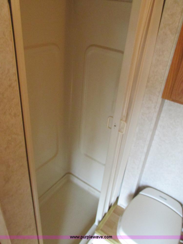 image for item F4402 2002 H&H 28' cargo trailer with living quarters