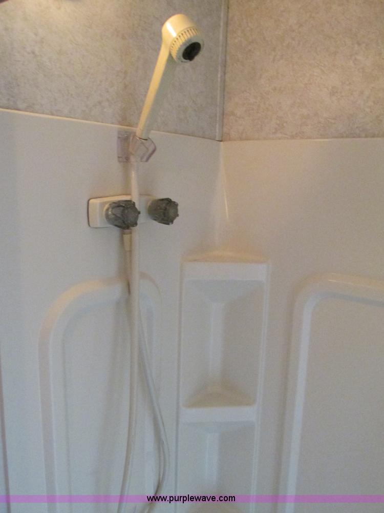 image for item F4402 2002 H&H 28' cargo trailer with living quarters