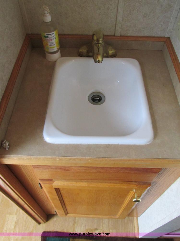 image for item F4402 2002 H&H 28' cargo trailer with living quarters