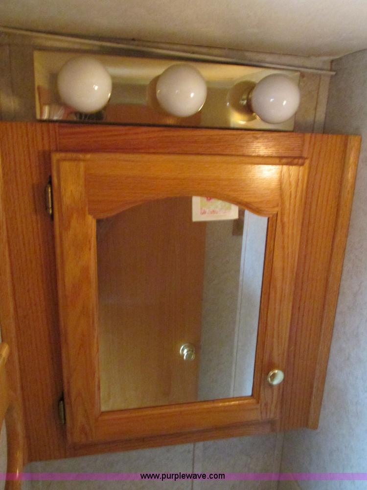 image for item F4402 2002 H&H 28' cargo trailer with living quarters