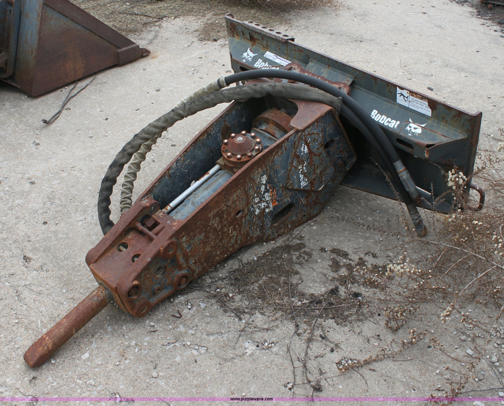 Bobcat concrete breaker skid steer attachment in Emporia, KS Item