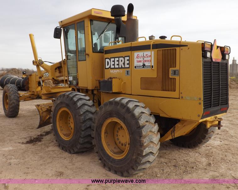 image for item F6420 1998 John Deere 770CH articulated motor grader