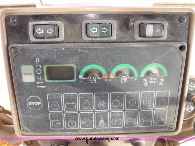 image for item F6420 1998 John Deere 770CH articulated motor grader