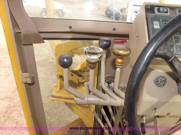 image for item F6420 1998 John Deere 770CH articulated motor grader