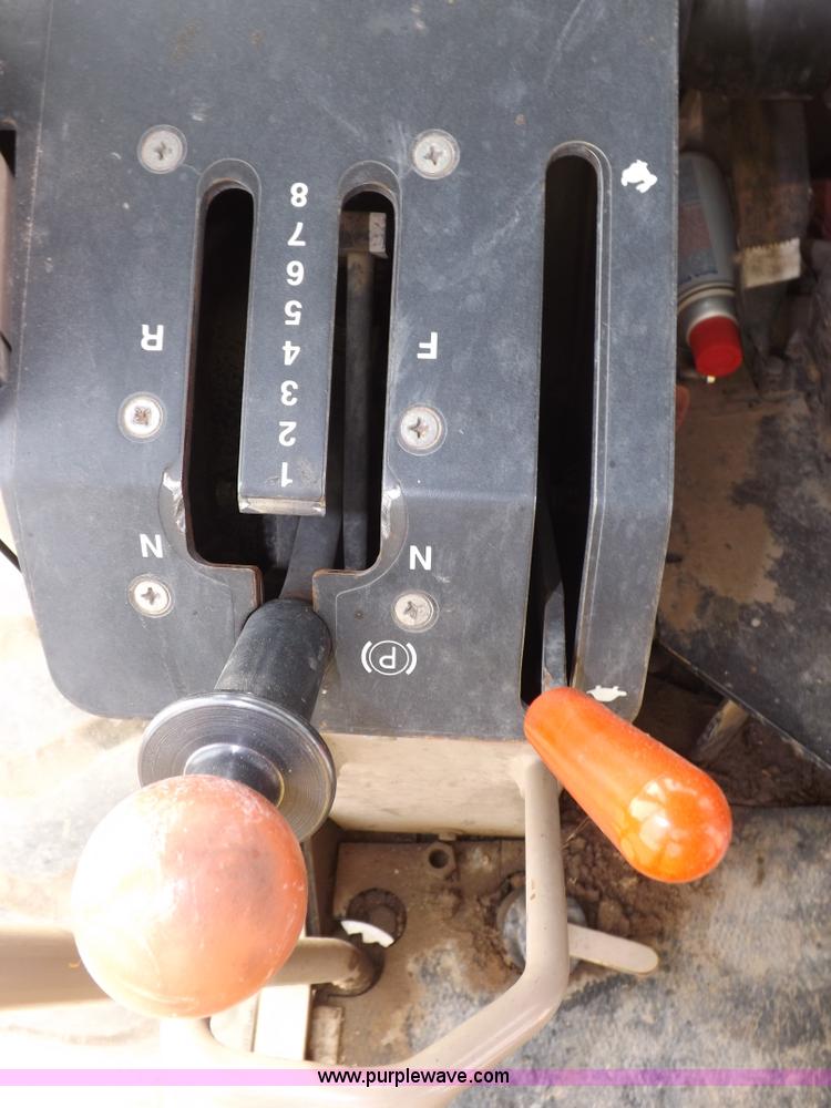 image for item F6420 1998 John Deere 770CH articulated motor grader