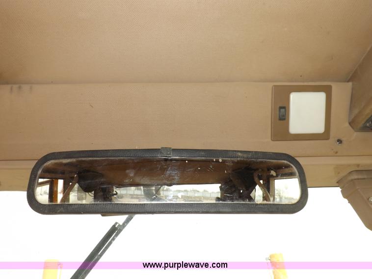 image for item F6420 1998 John Deere 770CH articulated motor grader