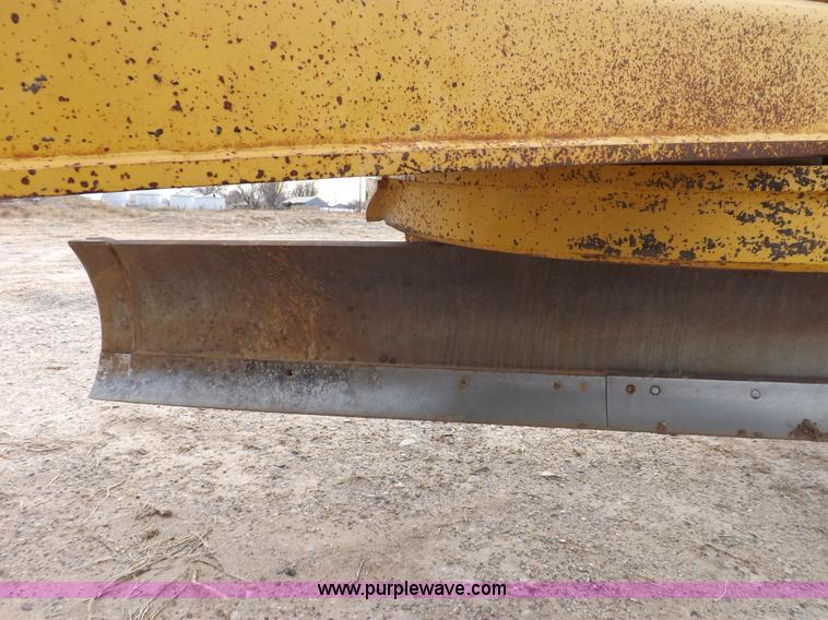 image for item F6420 1998 John Deere 770CH articulated motor grader