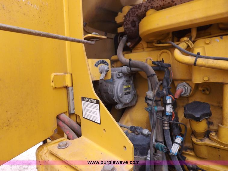 image for item F6420 1998 John Deere 770CH articulated motor grader