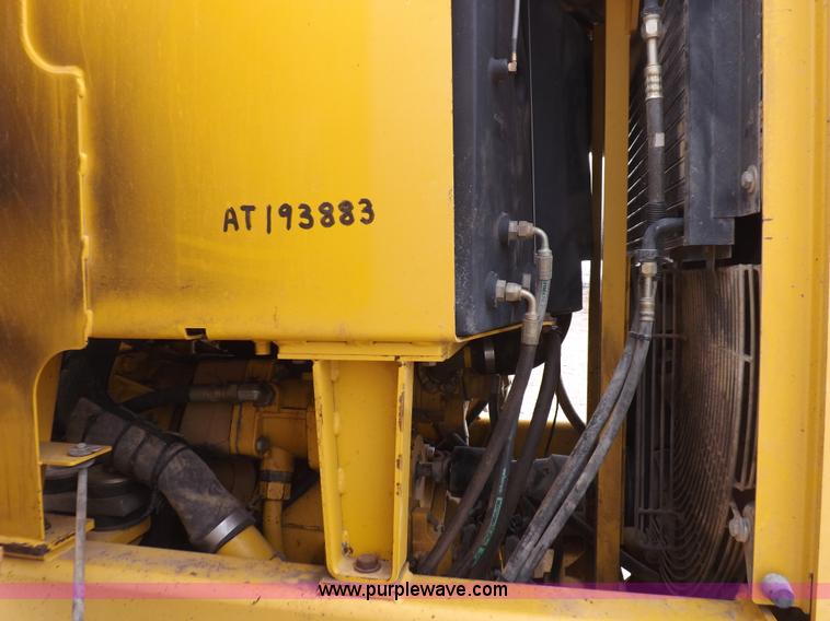 image for item F6420 1998 John Deere 770CH articulated motor grader