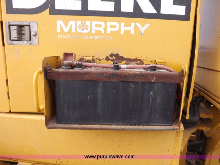 image for item F6420 1998 John Deere 770CH articulated motor grader