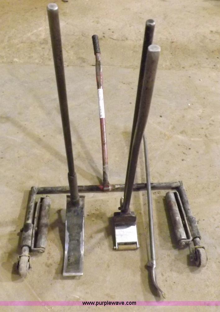 image for item J9174 Tire dolly and assorted tire repair tools