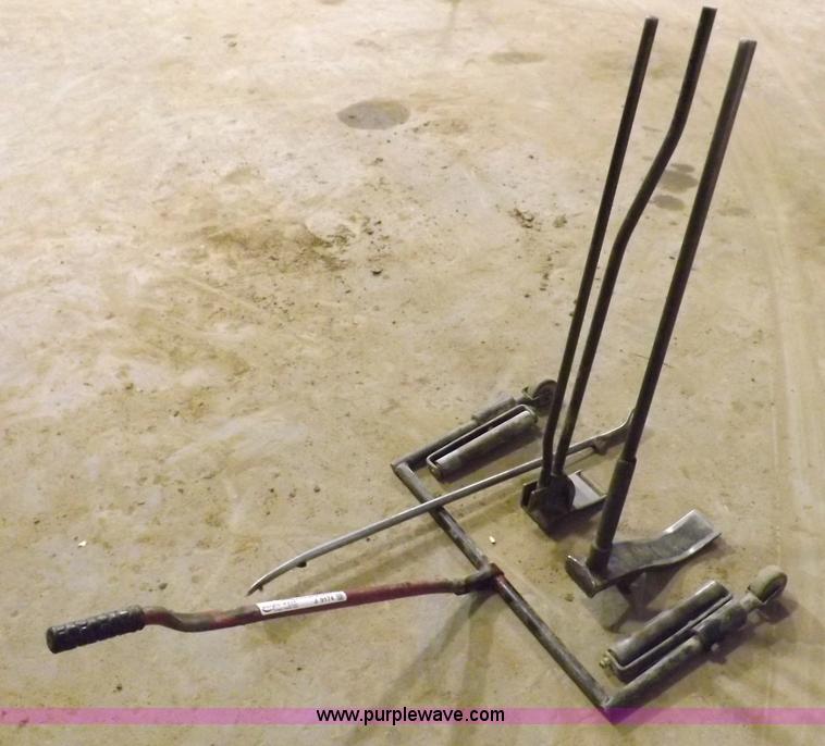 image for item J9174 Tire dolly and assorted tire repair tools