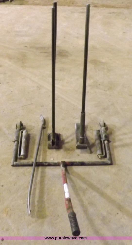 image for item J9174 Tire dolly and assorted tire repair tools
