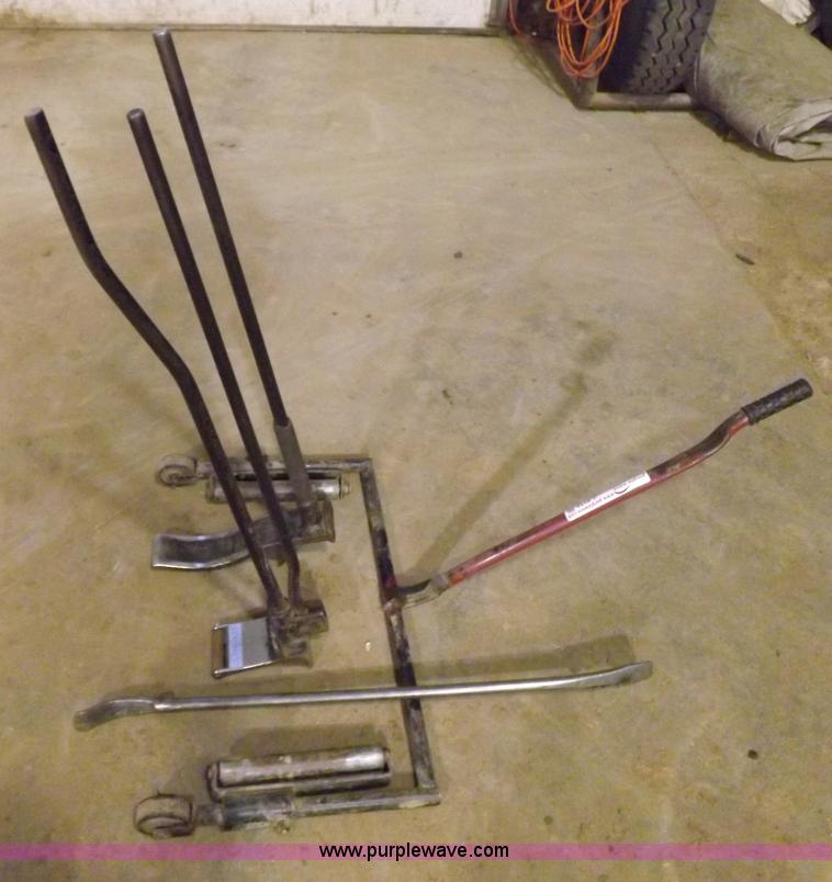 image for item J9174 Tire dolly and assorted tire repair tools