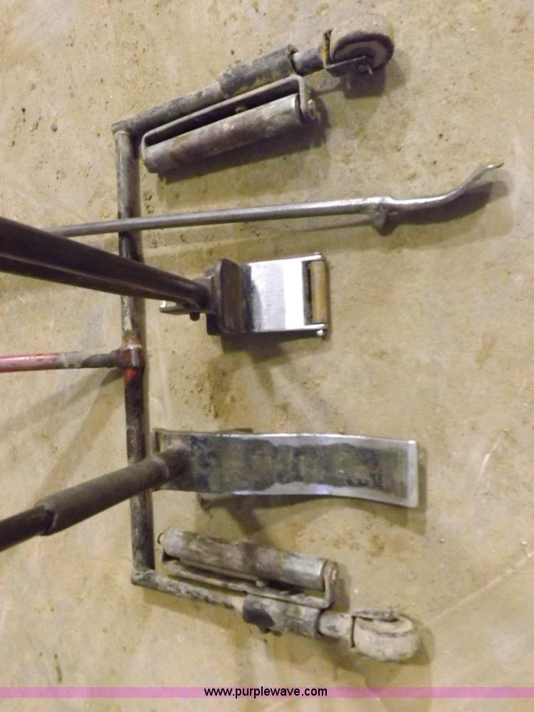 image for item J9174 Tire dolly and assorted tire repair tools