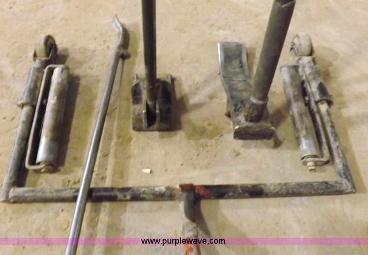 image for item J9174 Tire dolly and assorted tire repair tools