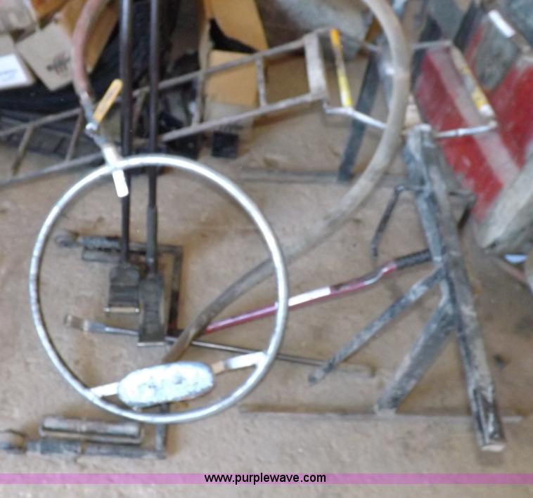 image for item J9174 Tire dolly and assorted tire repair tools