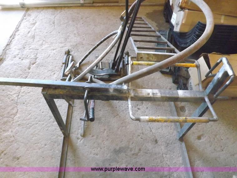 image for item J9174 Tire dolly and assorted tire repair tools