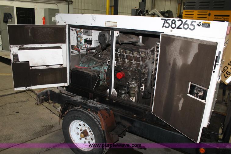 image for item W9463 Multi Quip Whisperwatt 25 portable generator