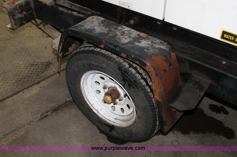 image for item W9463 Multi Quip Whisperwatt 25 portable generator