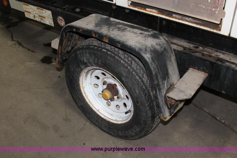 image for item W9463 Multi Quip Whisperwatt 25 portable generator