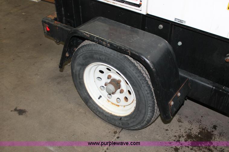 image for item W9464 Multi Quip Whisperwatt 25 portable generator