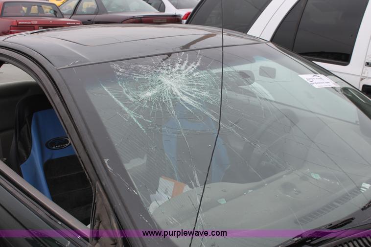 image for item E3175 1997 Saturn SC1