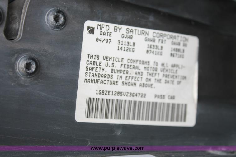 image for item E3175 1997 Saturn SC1