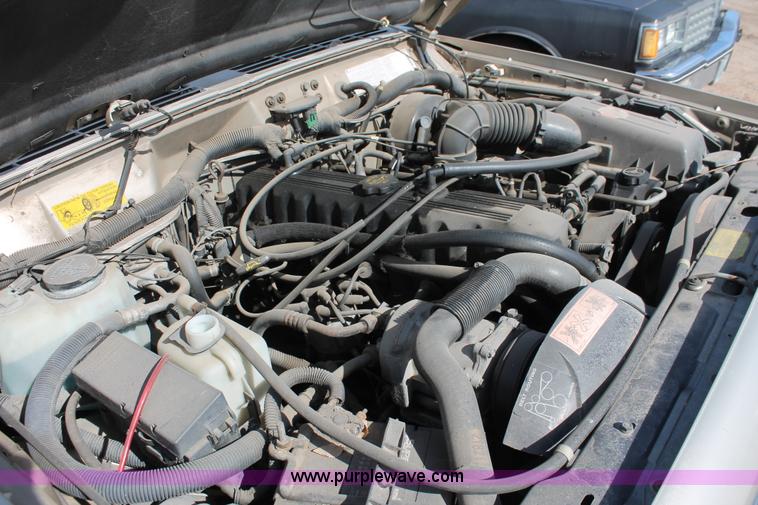 image for item E3201 1993 Jeep Cherokee Country SUV