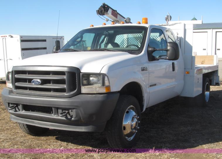image for item B5396 2003 Ford F450 XL Super Duty SuperCab flatbed truck