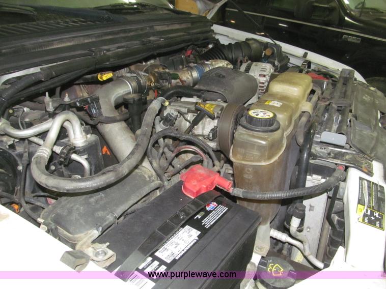 image for item B5396 2003 Ford F450 XL Super Duty SuperCab flatbed truck