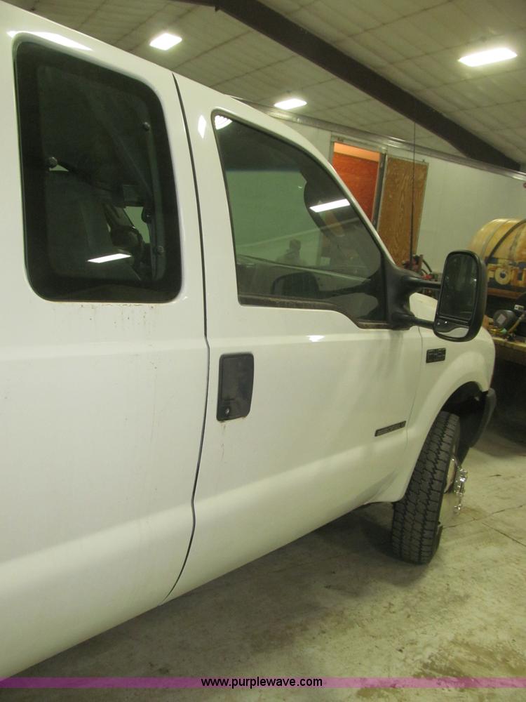 image for item B5396 2003 Ford F450 XL Super Duty SuperCab flatbed truck