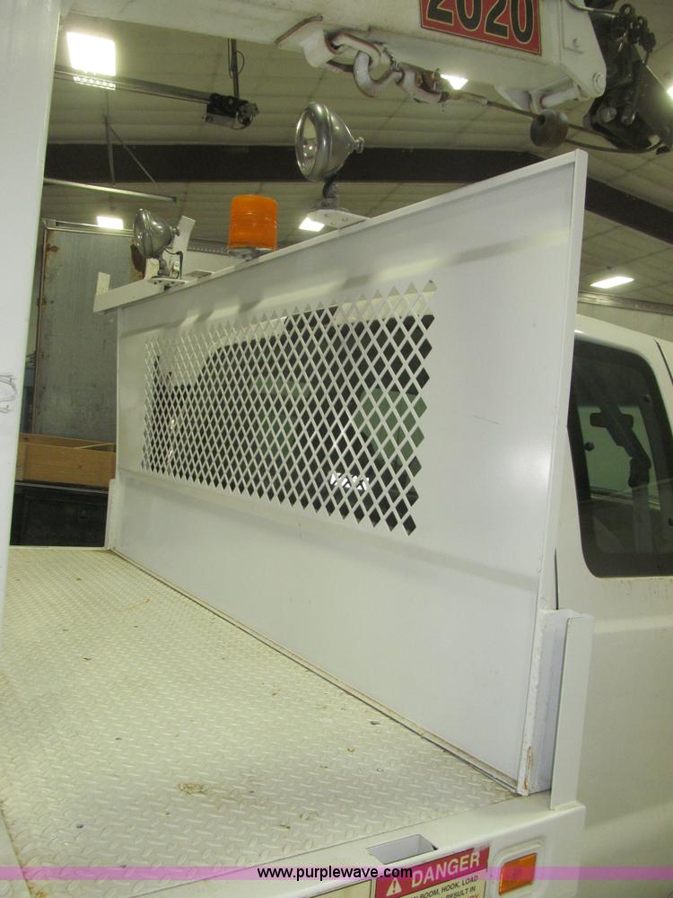 image for item B5396 2003 Ford F450 XL Super Duty SuperCab flatbed truck