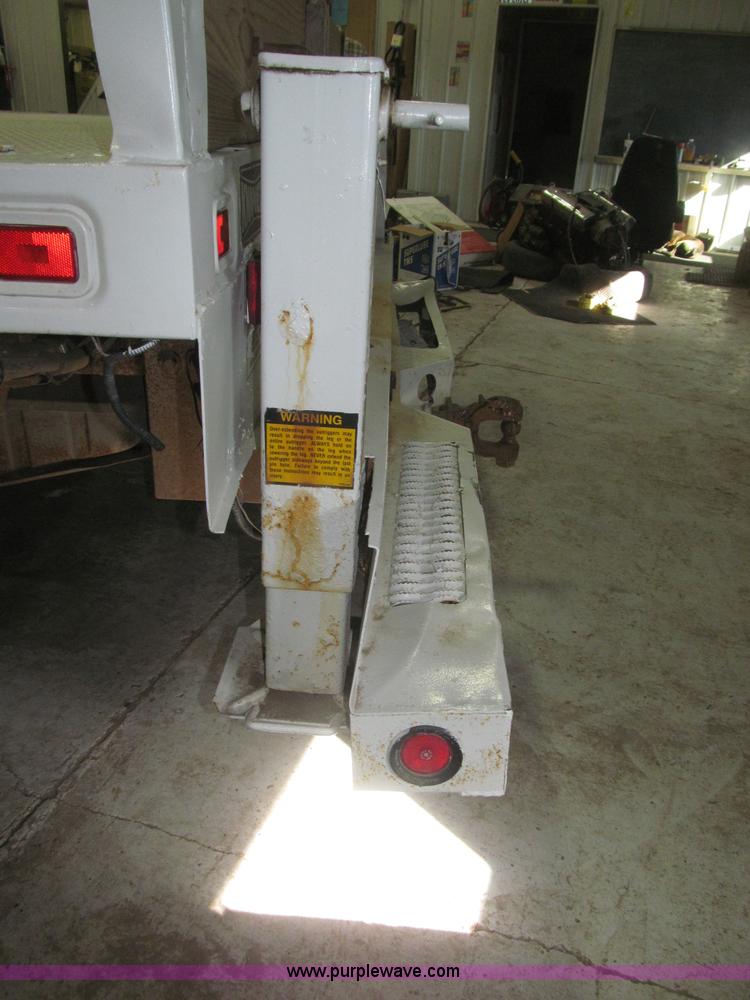 image for item B5396 2003 Ford F450 XL Super Duty SuperCab flatbed truck