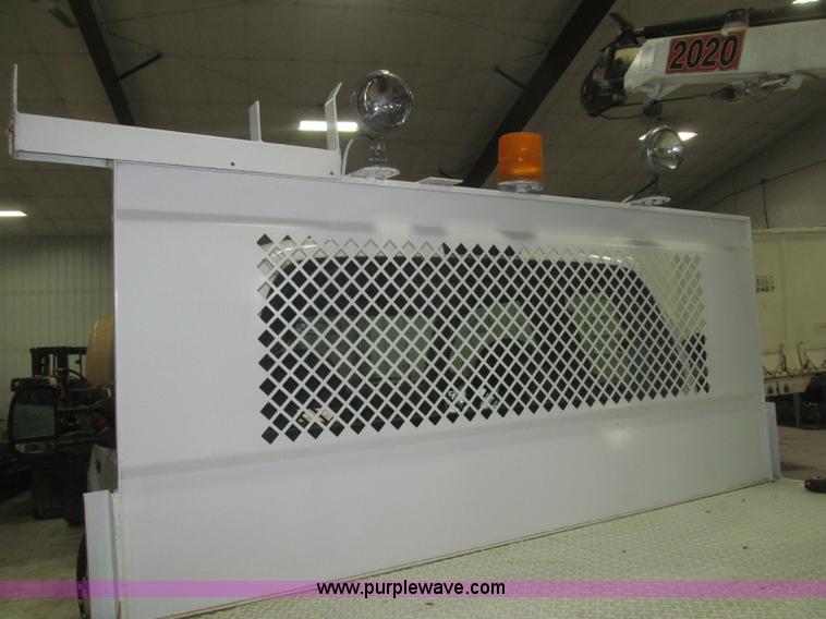 image for item B5396 2003 Ford F450 XL Super Duty SuperCab flatbed truck