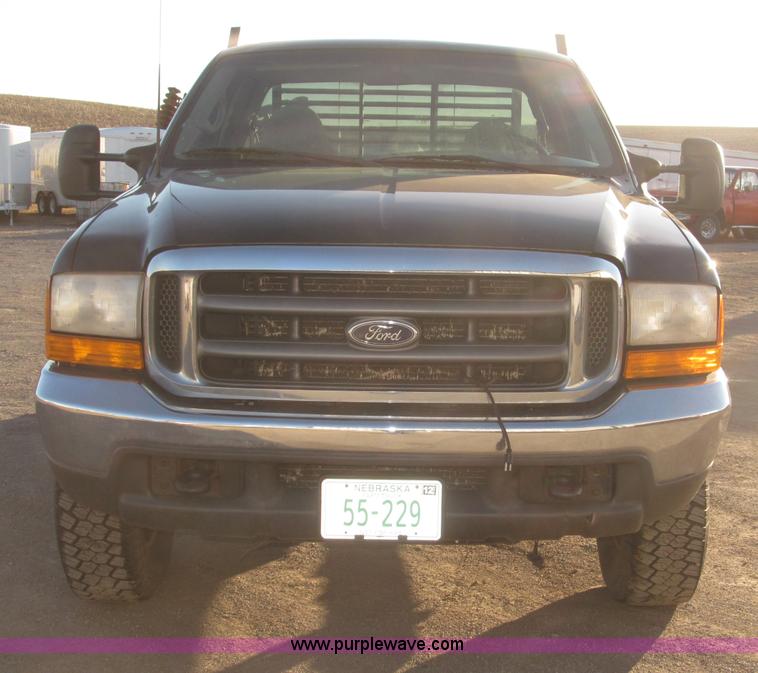 image for item B5400 1999 Ford F350 XLT SuperCab flatbed truck