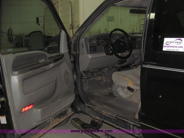 image for item B5400 1999 Ford F350 XLT SuperCab flatbed truck