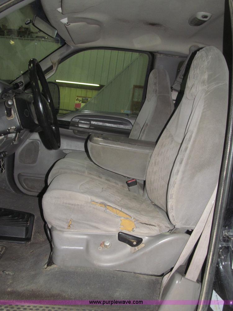 image for item B5400 1999 Ford F350 XLT SuperCab flatbed truck