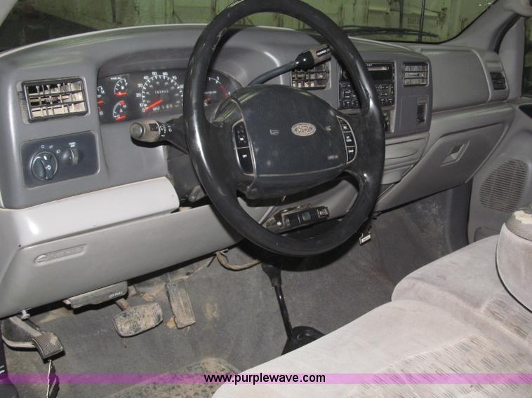 image for item B5400 1999 Ford F350 XLT SuperCab flatbed truck