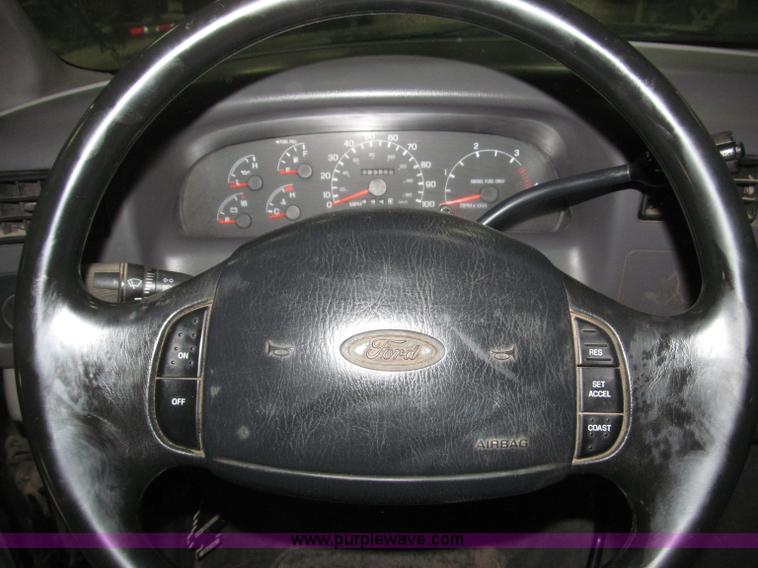 image for item B5400 1999 Ford F350 XLT SuperCab flatbed truck