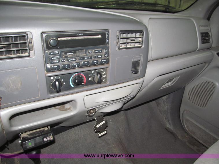 image for item B5400 1999 Ford F350 XLT SuperCab flatbed truck