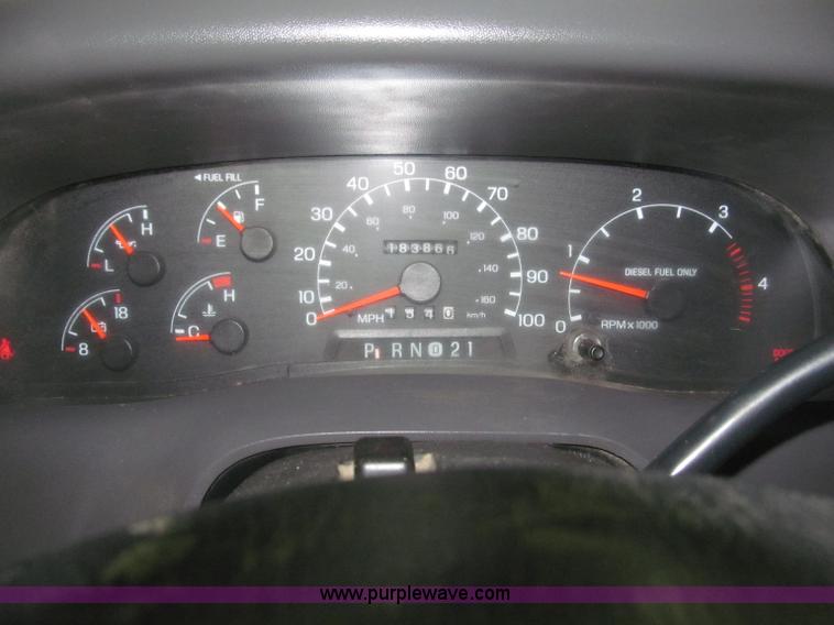 image for item B5400 1999 Ford F350 XLT SuperCab flatbed truck