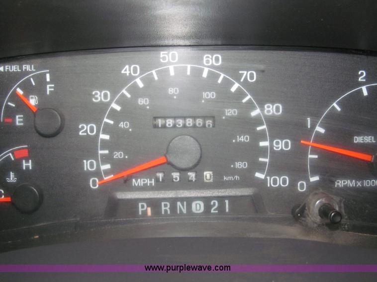 image for item B5400 1999 Ford F350 XLT SuperCab flatbed truck