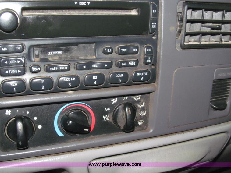 image for item B5400 1999 Ford F350 XLT SuperCab flatbed truck