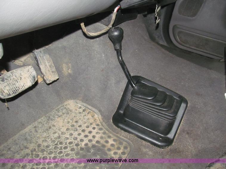 image for item B5400 1999 Ford F350 XLT SuperCab flatbed truck