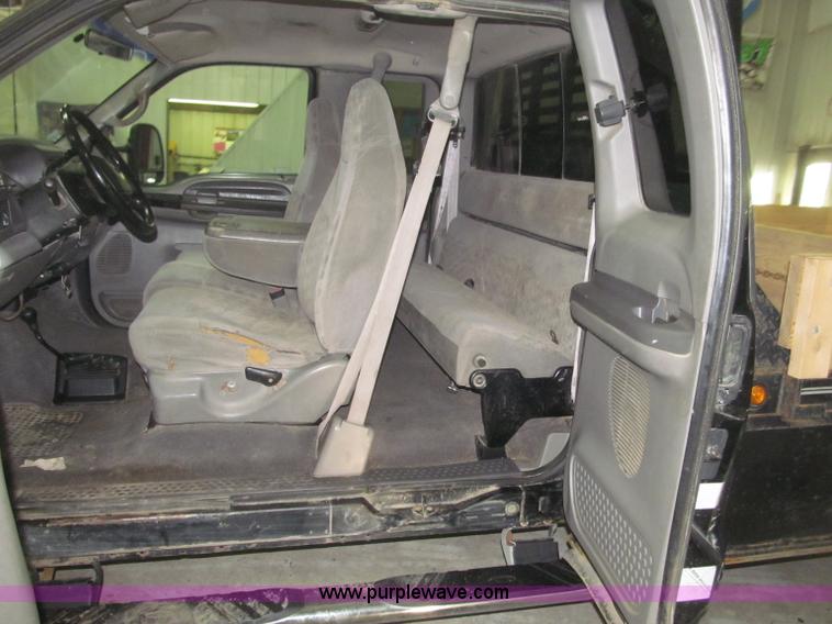 image for item B5400 1999 Ford F350 XLT SuperCab flatbed truck